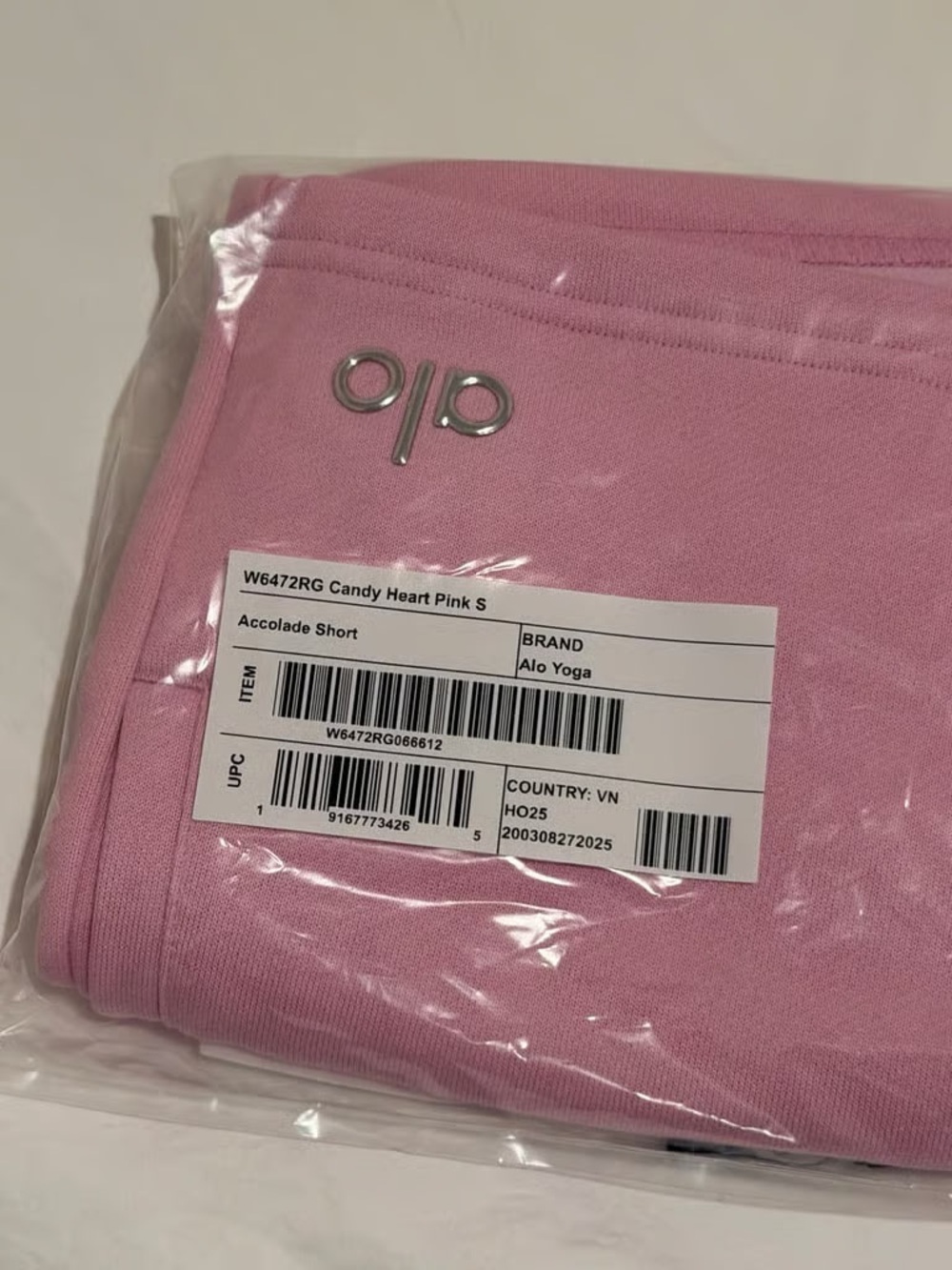 ALO Yoga Relaxed High-Rise Athletic Shorts in Light Pink - Picture 4 of 4